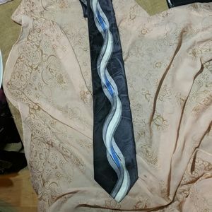 100% silk Puritan Tie. Gray, black and white w blu